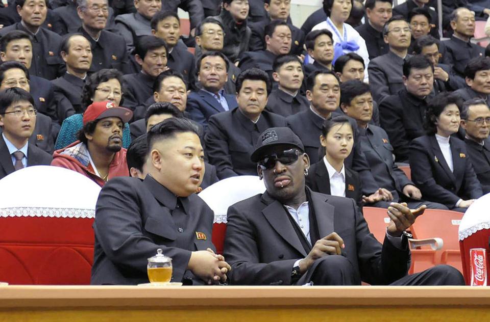 North Korean leader Kim Jong-Un and former NBA star Dennis Rodman speak at a basketball game in Pyongyang in 2013.