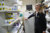 Licensed veterinary technician Jeanine Lunz looks over medical supplies at the City Pets office before leaving for a house call with Dr. Amy Attas, Tuesday, April 23, 2024, in New York. (AP Photo/Mary Altaffer)