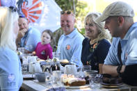 US First Lady Jill Biden smiles as she meets military surfers and their families in Newlyn, Cornwall, England, on the sidelines of the G7 summit, Saturday June 12, 2021. US First Lady Jill Biden met with veterans, first responders and family members of Bude Surf Veterans, a Cornwall-based volunteer organization that provides social support and surfing excursions for veterans, first responders and their families. (Daniel Leal-Olivas/Pool via AP)