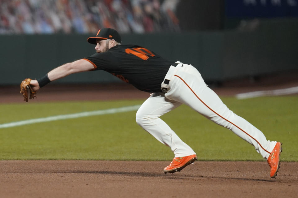 San Francisco Giants third baseman Evan Longoria catches a line out hit by San Diego Padres' Tommy Pham during the sixth inning of a baseball game Saturday, Sept. 26, 2020, in San Francisco. (AP Photo/Eric Risberg)