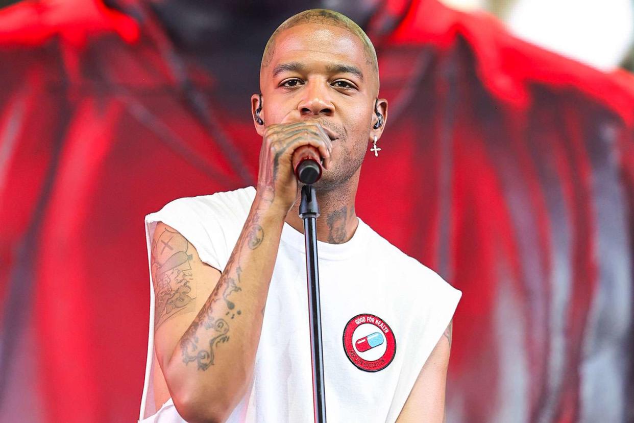 <p>Theo Wargo/Getty</p> Kid Cudi performing on stage during Coachella in Indio, California on April 21, 2024