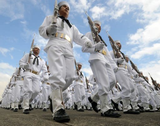 The Philippine Navy march during the 76th anniversary of the Armed Forces of the Philippines at Camp Aguinaldo military headquarters in Quezon city suburban Manila, in 2011. The Philippines said on Wednesday it would hold large-scale military exercises with the United States next month near an area where it is locked in a tense sea territorial row with China