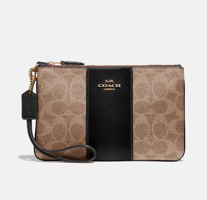 Small Wristlet In Colorblock Signature Canvas. Image via Coach.