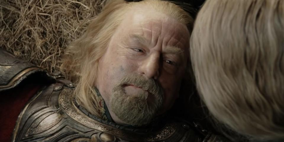 King Theoden lying on the ground in lord of the rings