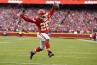 Kansas City Chiefs running back Clyde Edwards-Helaire celebrates as he scores scoring on a touchdown run during the first half of an NFL football game against the Pittsburgh Steelers Sunday, Dec. 26, 2021, in Kansas City, Mo. (AP Photo/Ed Zurga)