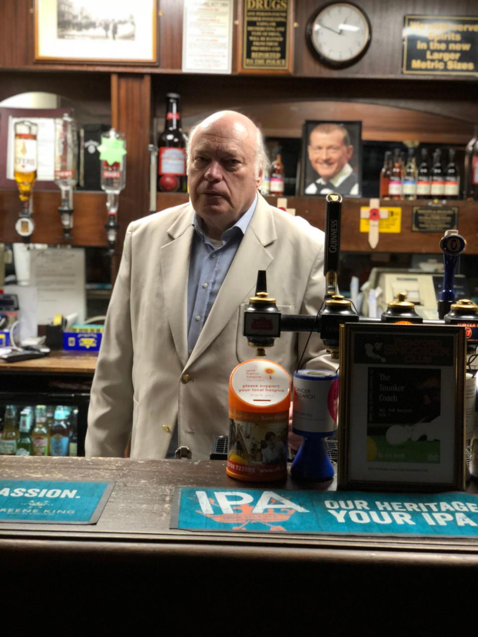 Richard Willis, owner of the Romford Snooker Club, stands behind the club's bar on Feb. 4, 2019.