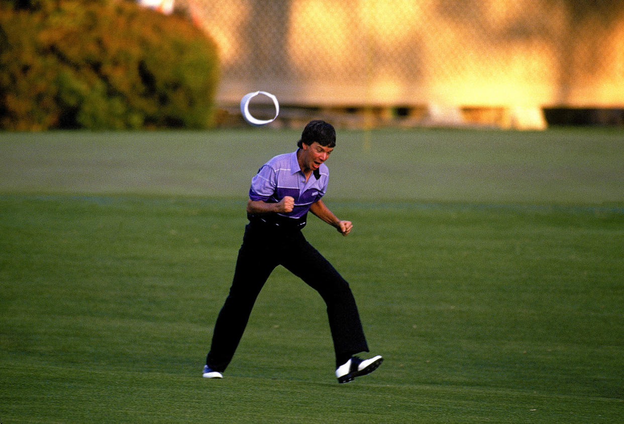 Larry Mize celebrates chipping in on the second playoff hole to win the 1987 Masters. (David Cannon/Allsport/Getty)