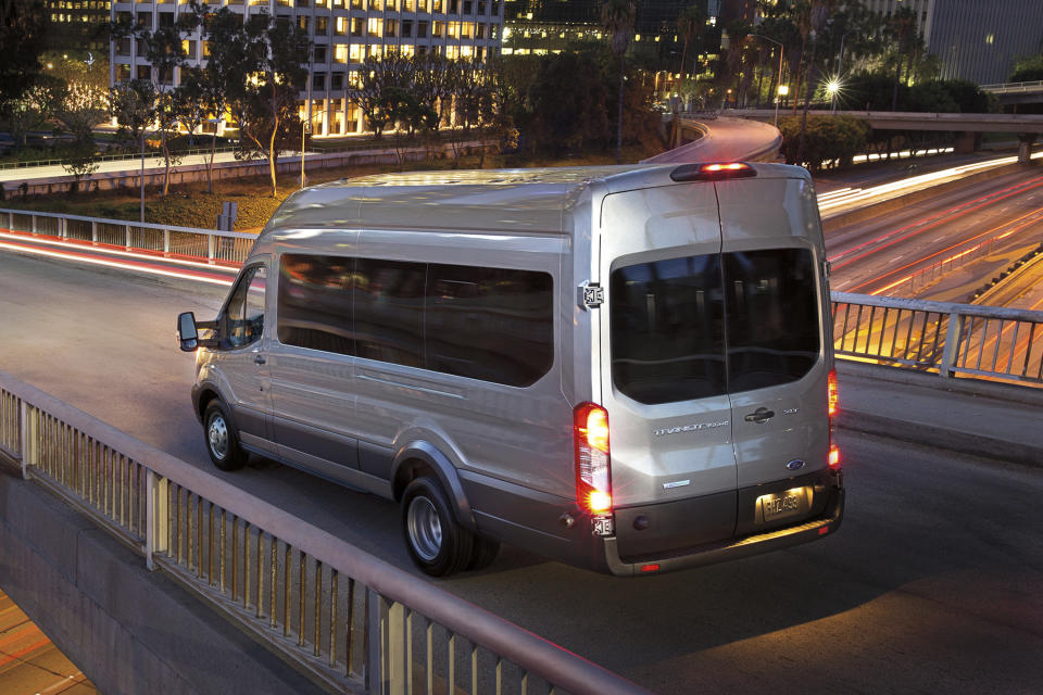 This undated photo provided by Ford Motor Co. shows the Transit passenger van. It has many available seating configurations, including a maximum 15-passenger seating capacity. (Ford Motor Co. via AP)