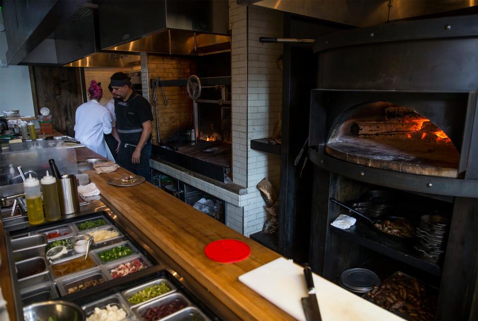 Red Ash, seen in 2017, is in the Colorado Tower. A fire started inside the oven and hood system in the kitchen Monday night, leading to an evacuation and temporary closure of the restaurant.