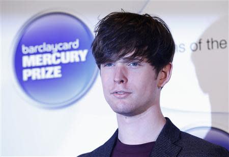 Musician James Blake, nominated for the Mercury Music Prize, poses for a photograph ahead of the ceremony in north London, October 30, 2013. REUTERS/Olivia Harris