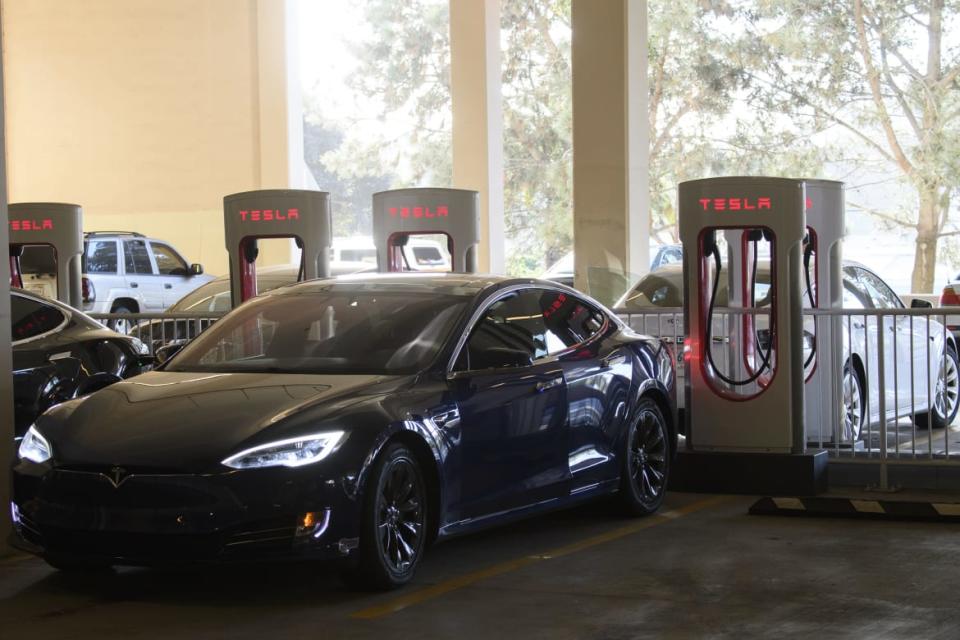 <div class="inline-image__caption"><p>A Tesla supercharger station in Redondo Beach, California.</p></div> <div class="inline-image__credit">Patrick T. Fallon/AFP via Getty Images</div>