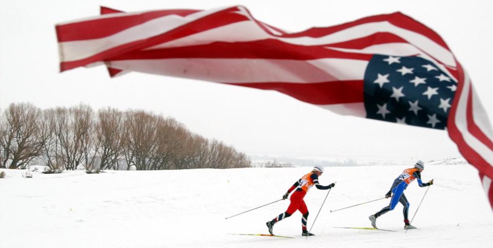 Marit Bjoergen, left, of Norway, and Katrin Smigun, of Estonia, race in the women’s 30k cross-country race at Soldier Hollow on Sunday, Feb. 24, 2002. | Jason Olson, Deseret News