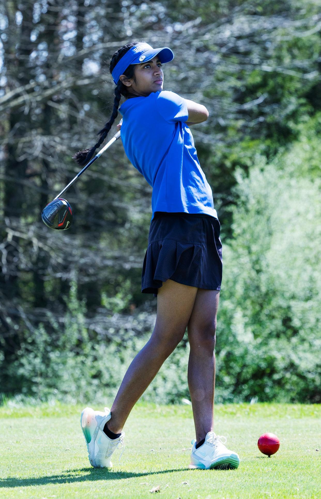 Sirina Gang of Holmdel drives on the 10th hole. Monmouth County Girls Golf Tournament at Charleston Springs in Millstone, NJ on April 15, 2024.