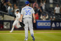 Kansas City Royals relief pitcher Greg Holland (35) looks to the outfield as New York Yankees pinch runner Tyler Wade, left, heads home to score after Luke Voit's game-winning RBI single in the bottom of the ninth inning of a baseball game, Wednesday, June 23, 2021, at Yankee Stadium in New York. (AP Photo/Kathy Willens)
