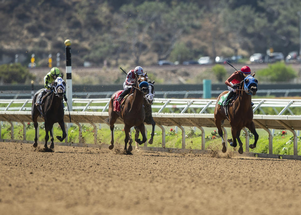 In this image provided by Benoit Photo, Big Sweep, right, with Flavien Prat aboard, wins the $125,000 Fleet Treat Stakes horse race Friday, July 24, 2020, at Del Mar Thoroughbred Club in Del Mar, Calif. (Benoit Photo via AP)
