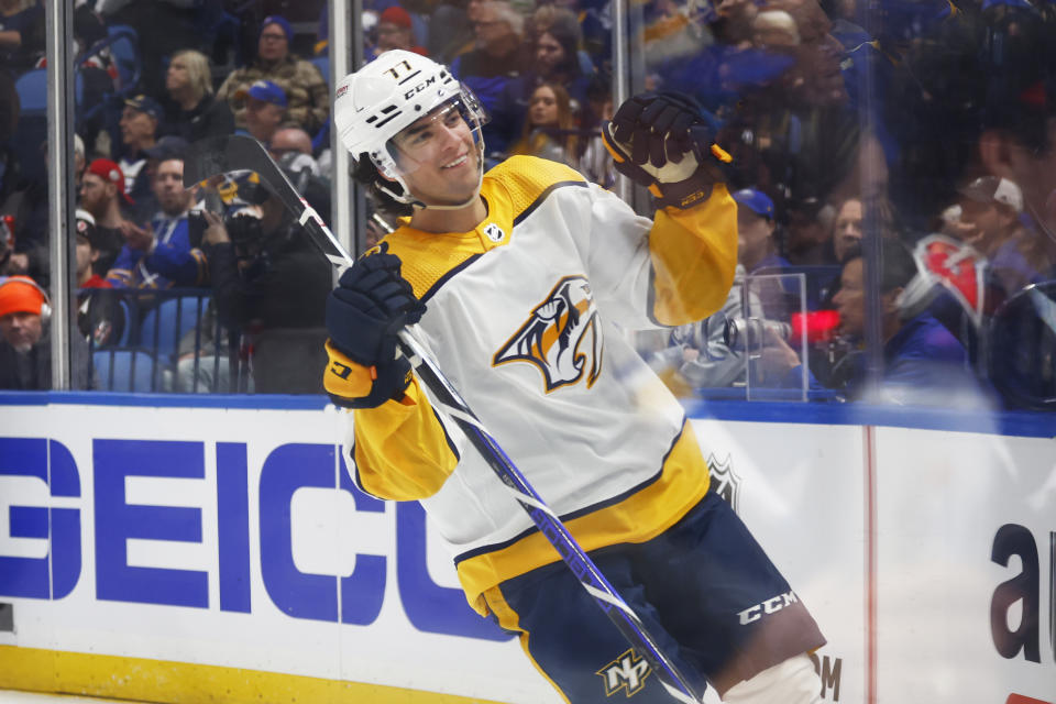 Nashville Predators right wing Luke Evangelista (77) celebrates his goal during the second period of an NHL hockey game against the Buffalo Sabres, Tuesday, March 21, 2023, in Buffalo, N.Y. (AP Photo/Jeffrey T. Barnes)