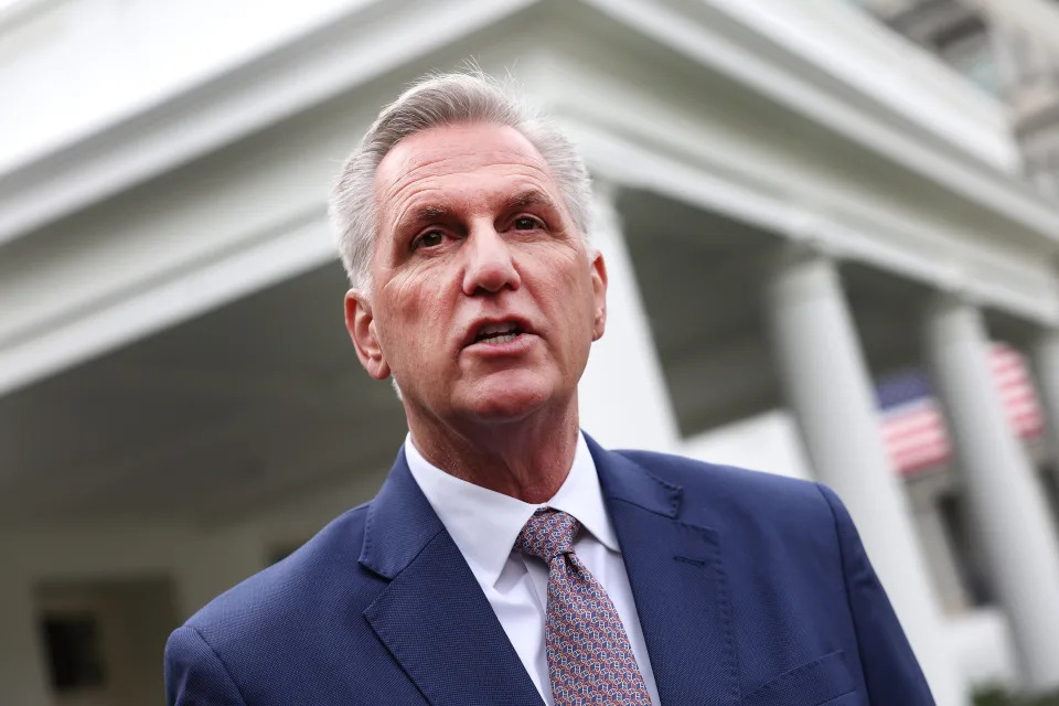 Kevin McCarthy speaks to reporters outside the portico of the White House.