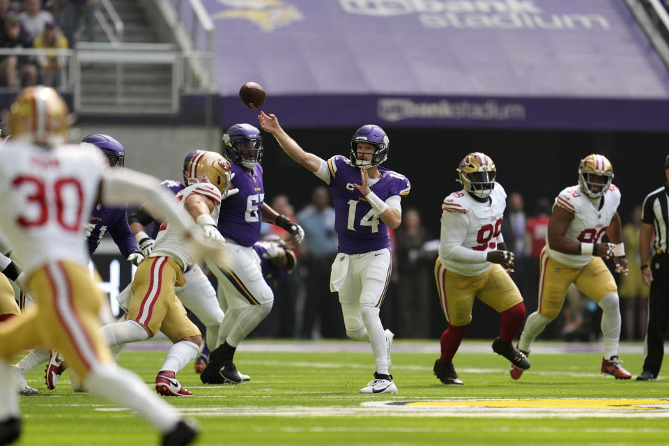 Minnesota Vikings quarterback Sam Darnold (14) throws a pass during the first half of an NFL football game against the San Francisco 49ers, Sunday, Sept. 15, 2024, in Minneapolis. (AP Photo/Abbie Parr)