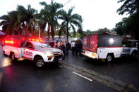 Police vehicles used to carry bodies leave at the gated community where a plane crashed in Vinhedo, Sao Paulo state, Brazil, Saturday, Aug. 10, 2024. (AP Photo/Andre Penner)