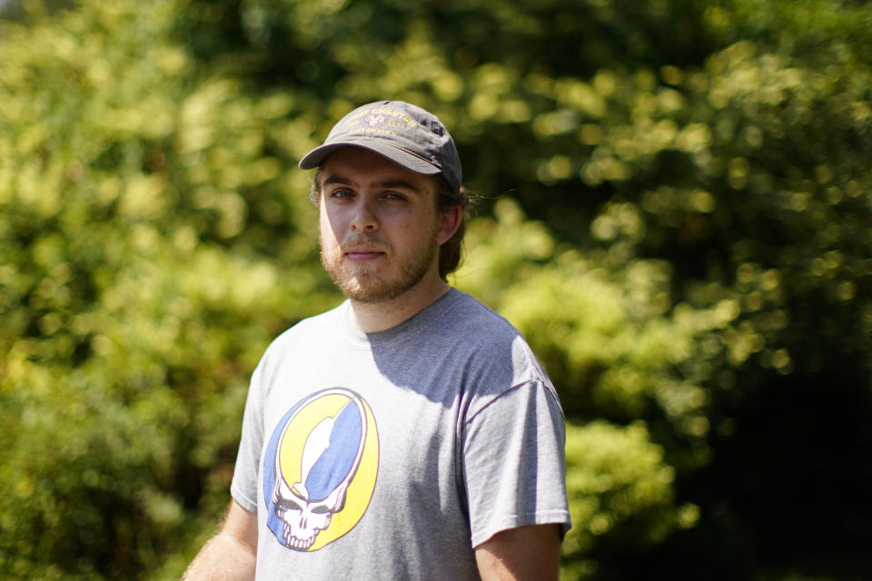 Nick Marcil, 24, of Wayne, Pa., poses for a photograph on Wednesday, Aug. 24, 2022, in Devon, Pa. (AP Photo/Matt Slocum)