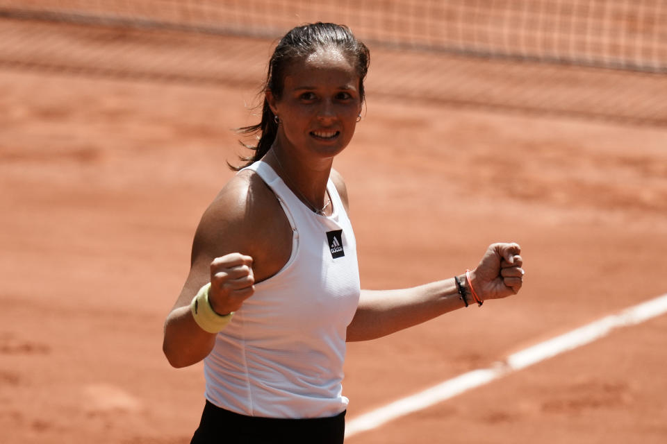 Russia's Daria Kasatkina celebrates as she defeats Russia's Veronika Kudermetova during their quarterfinal match of the French Open tennis tournament at the Roland Garros stadium Wednesday, June 1, 2022 in Paris. Kasatkina won 6-4, 7-6 (7/5). (AP Photo/Thibault Camus)