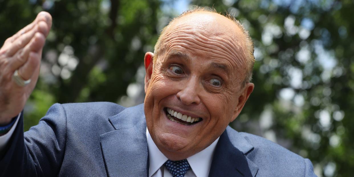 Rudy Giuliani talking to reporters.