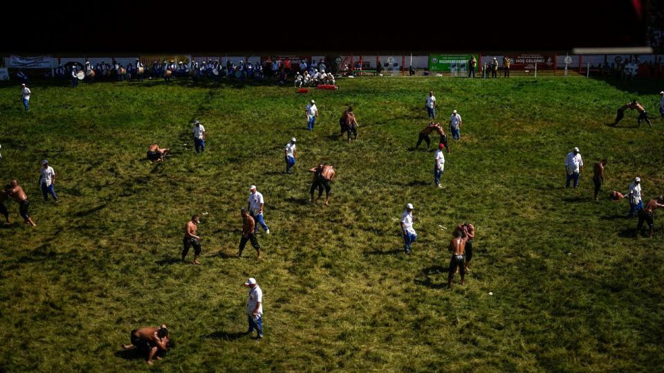 Wrestlers compete during the 663rd annual Historic Kirkpinar Oil Wrestling championship, in Edirne, northwestern Turkey.