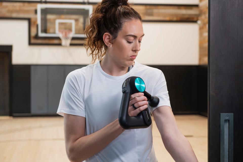 Breanna Stewart uses Therabody's Theragun to alleviate and prevent soreness.