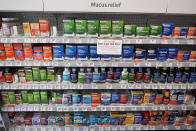 Medications are displayed on shelves at a Walgreens pharmacy store in Deerfield, Ill., Thursday, July 25, 2024. (AP Photo/Nam Y. Huh)