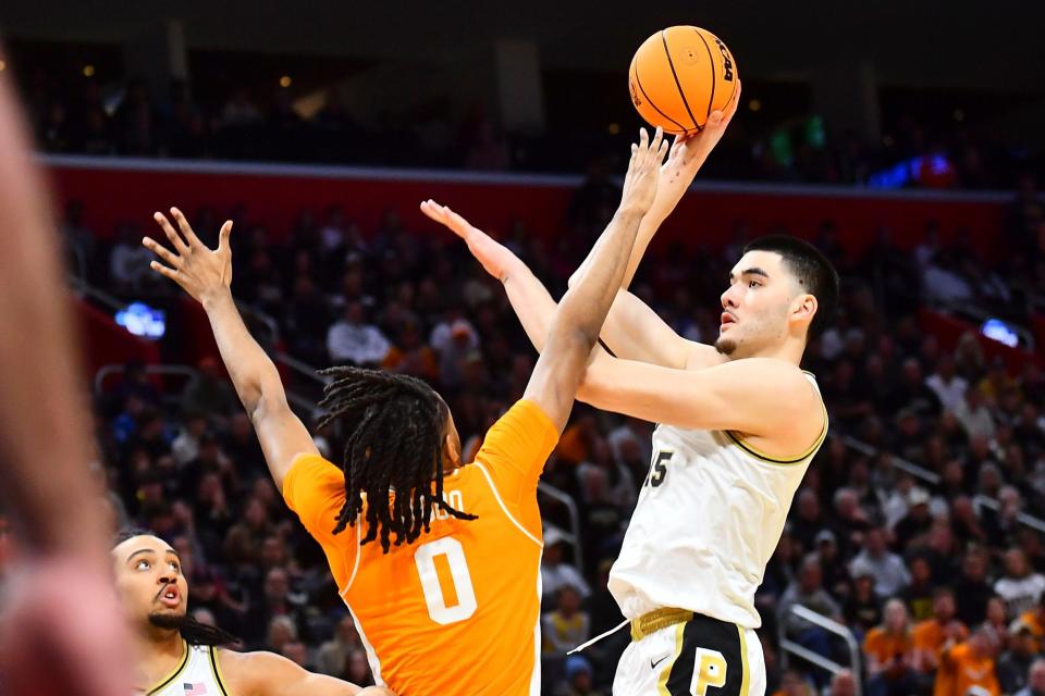 Tennessee forward Jonas Aidoo (0) defends Purdue center Zach Edey (15) during the NCAA Tournament Elite Eight college basketball game at Little Caesars Arena in Detroit, MI on Sunday, March 31, 2024.