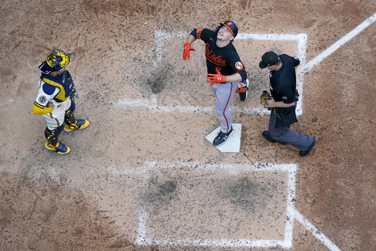 Brewers' Christian Yelich homers after brother, just out of Marines, throws  1st pitch