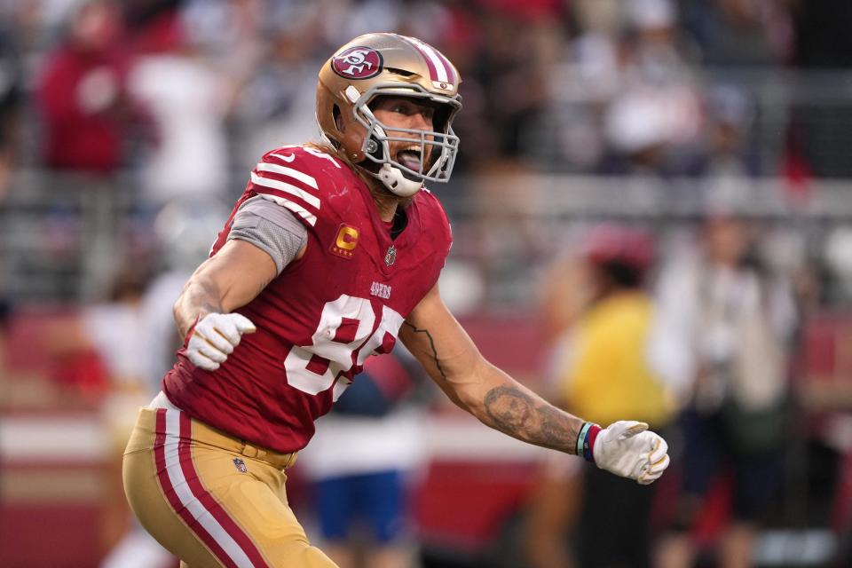 George Kittle celebrates after scoring a touchdown for the San Francisco 49ers.