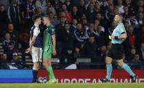 Britain Football Soccer - Scotland v Slovenia - 2018 World Cup Qualifying European Zone - Group F - Hampden Park, Glasgow, Scotland - 26/3/17 Scotland's Kieran Tierney and Slovenia's Roman Bezjak clash Reuters / Russell Cheyne Livepic