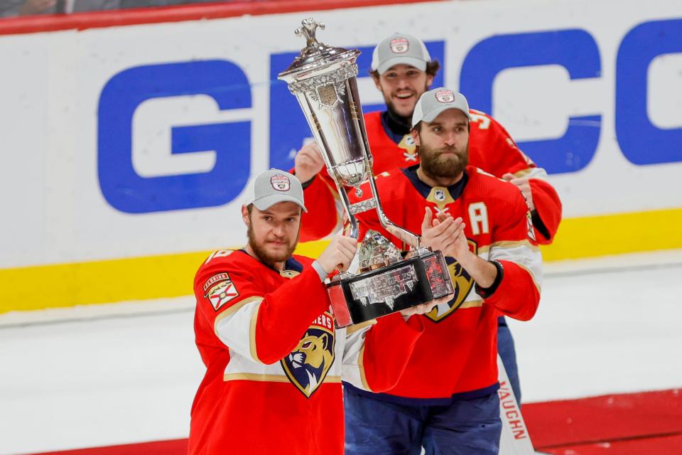 May 24, 2023;  Sunrise, Florida, USA;  Florida Panthers center Aleksander Barkov (16) celebrates with The Prince of Wales Trophy after defeating the Carolina Hurricanes in game four of the Eastern Conference Finals of the 2023 Stanley Cup Playoffs at FLA Live Arena.  Mandatory Credit: Sam Navarro-USA TODAY Sports