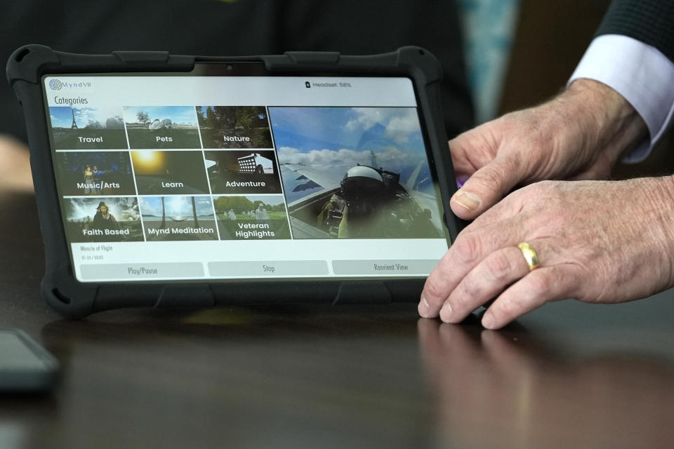 A screen displays categories of experiences that are offered for users of the Mynd Immersive virtual reality program, at John Knox Village, Wednesday, Jan. 31, 2024, in Pompano Beach, Fla. John Knox Village was one of 17 senior communities around the country that participated in a recently published Stanford University study that found that large majorities of 245 participants between 65- and 103-years-old enjoyed virtual reality, improving both their emotions and their interactions with staff. (AP Photo/Lynne Sladky)