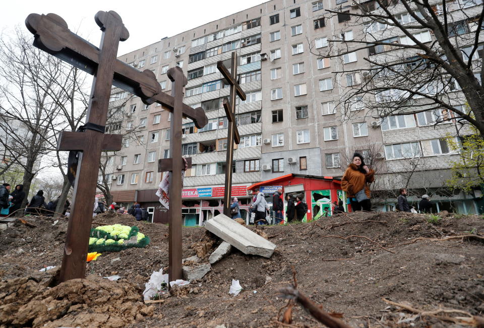 A view shows graves of civilians killed during Ukraine-Russia conflict in the southern port city of Mariupol, Ukraine April 19, 2022. / Credit: ALEXANDER ERMOCHENKO / REUTERS