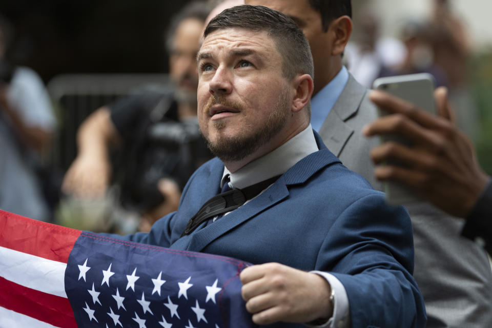 Jason Kessler marches with other white nationalists to Lafayette Square during the "Unite the Right 2" rally in Washington, Sunday, Aug. 12, 2018. (Craig Hudson/Charleston Gazette-Mail via AP)