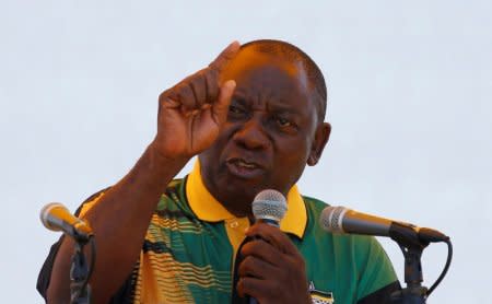 FILE PHOTO: African National Congress (ANC) President Cyril Ramaphosa addresses supporters during the Congress' 106th anniversary celebrations, in East London, South Africa, January 13, 2018. REUTERS/Siphiwe Sibeko