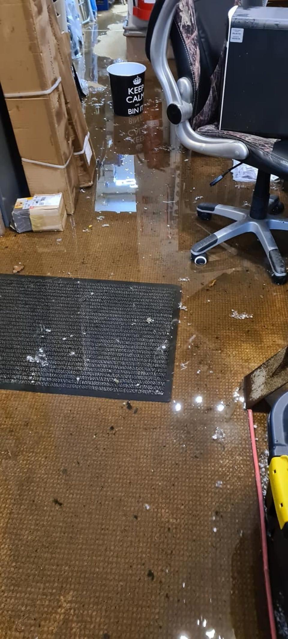 Water damage at The Tackle Box fishing shop after 92mm of rain fell on the Welsh seaside town of Criccieth in six hours on Friday (Russell Roster/PA) (PA Media)