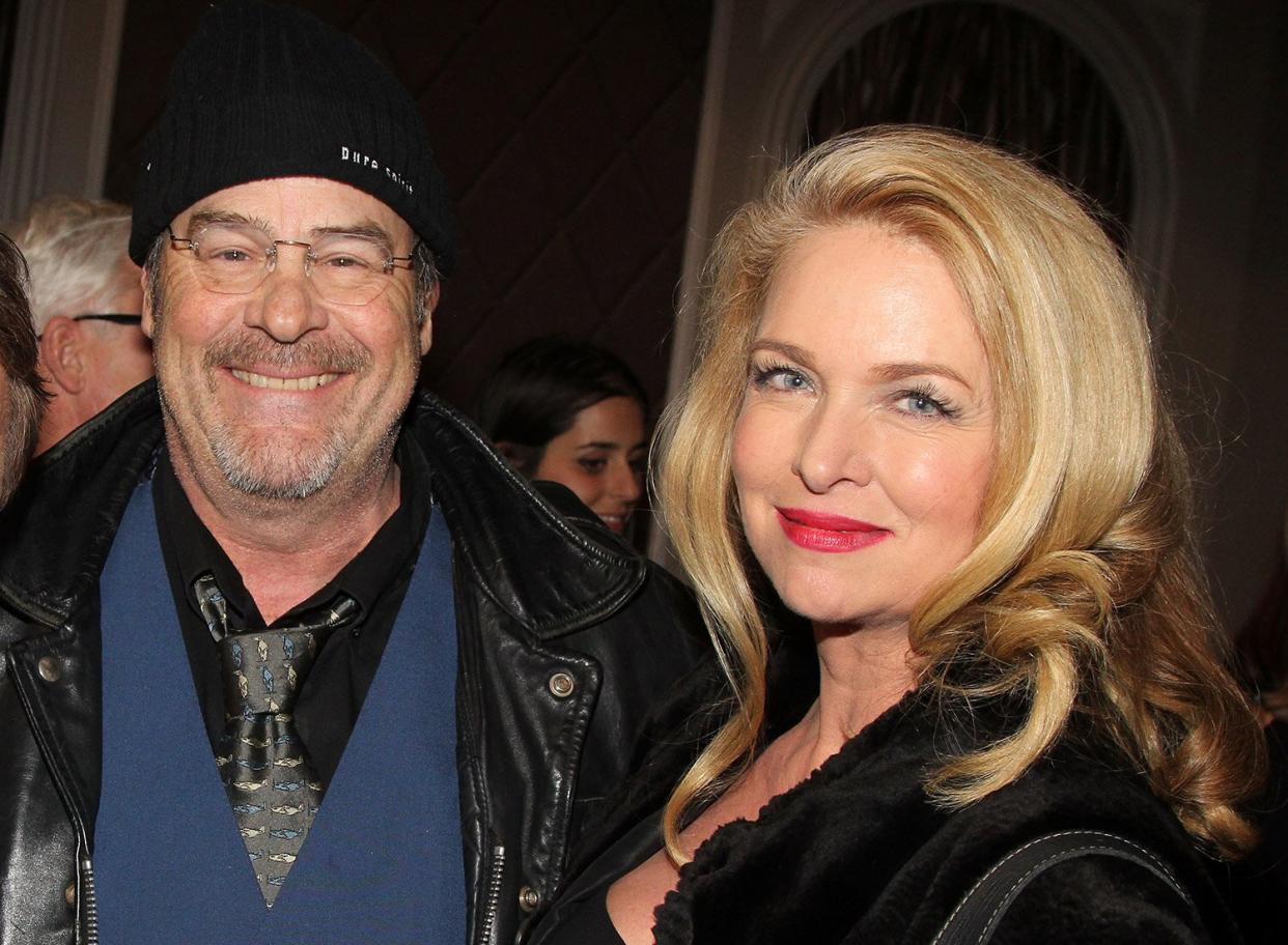 NEW YORK, NY - FEBRUARY 12: Dan Aykroyd and wife Donna Dixon pose backstage at the hit play "It;s Only a Play" on Broadway at The Jacobs Theater on February 12, 2015 in New York City. (Photo by Bruce Glikas/FilmMagic)