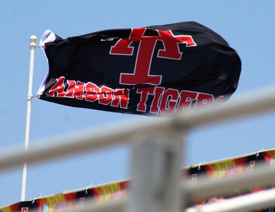 An Anson Tigers flag flies in a southerly wind that blew flyballs around Crutcher Scott Field at ACU on Saturday.