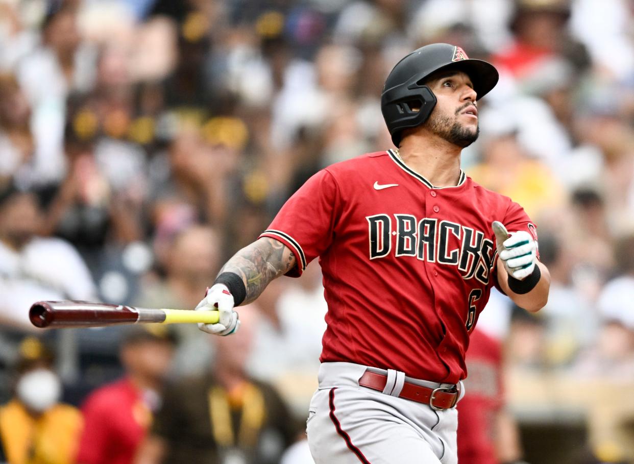 David Peralta #6 of the Arizona Diamondbacks watches the flight of his solo home run during the sixth inning of a baseball game against the San Diego Padres on July 17, 2022, at Petco Park in San Diego, California.
