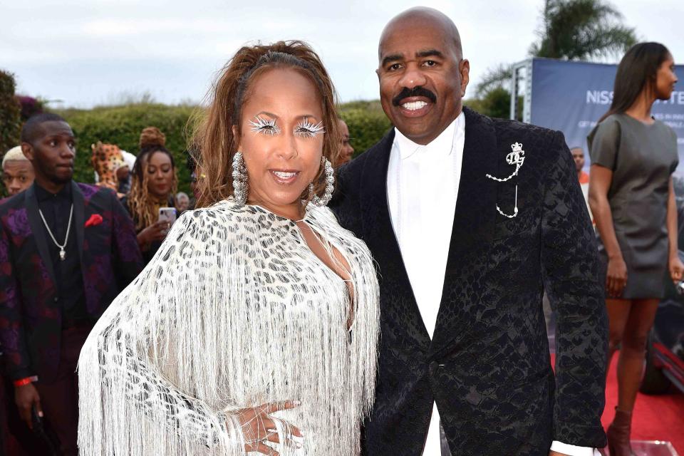 <p>Variety/Penske Media via Getty </p> Marjorie and Steve Harvey, who just celebrated 16 years of marriage, pose on the red carpet.