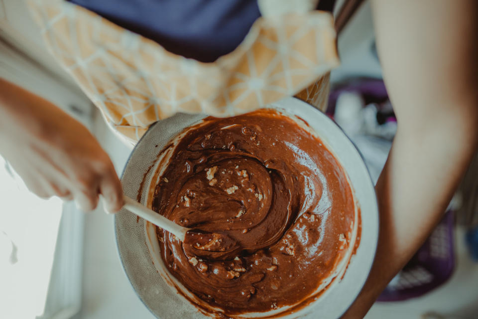 A woman baking chocolate cake