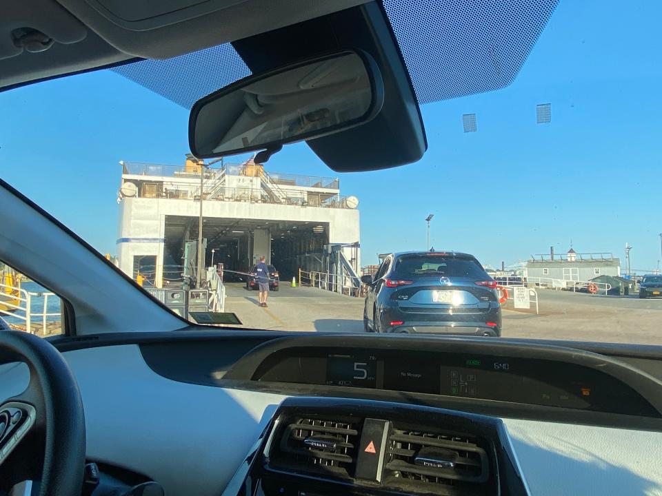 shot from inside a car driving onto a ferry