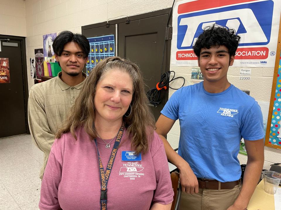 Tracy Anderson had two of her former STEM students − Evis Lopez (left) and Brian Galvan − come from Powell High School to visit her current students.