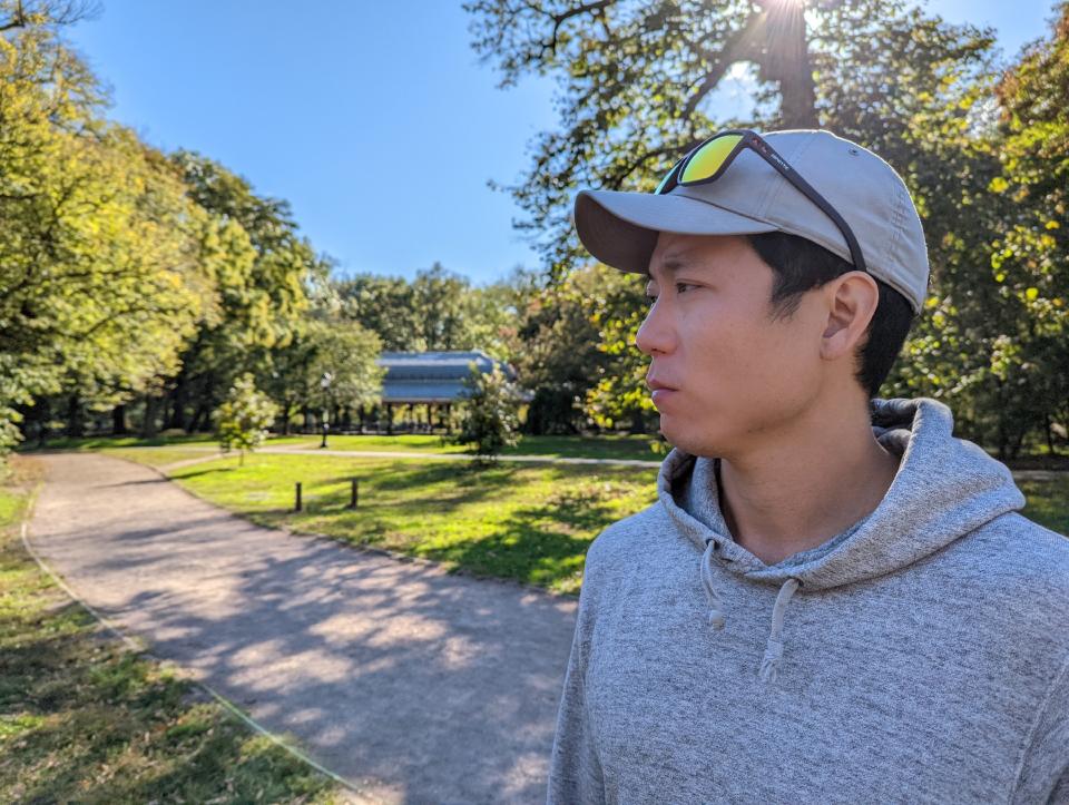 <p>Another Pixel 6 camera sample of a man in the park facing away from the camera with his face in focus. Google's Face Unblur tool combines pictures from the phone's cameras to keep your subject's faces sharp even if they were blurry.</p>
