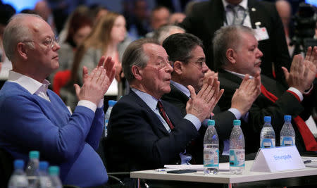 Germany's Social Democratic Party (SPD) former leaders Rudolf Scharping, Franz Muentefering, Sigmar Gabriel and Kurt Beck attend the SPD's one-day party congress in Bonn, Germany, January 21, 2018. REUTERS/Wolfgang Rattay