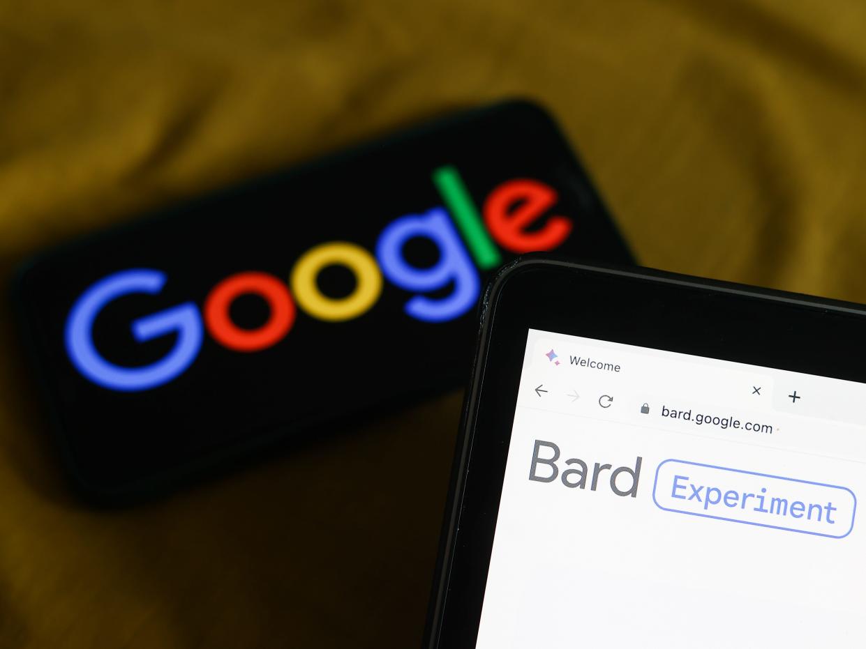 Google logo displayed on a phone screen and Bard website displayed on a laptop screen are seen in this illustration photo taken in Krakow, Poland on March 21, 2023.