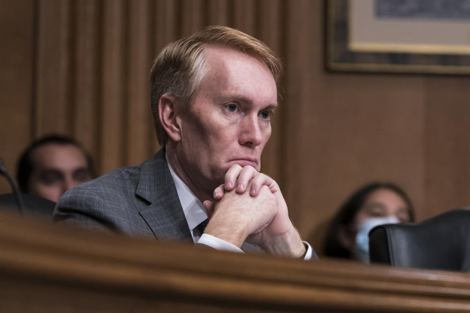 FILE - U.S. Sen. James Lankford, R-Okla., listens to testimony during a Senate Indian Affairs Committee at the Capitol in Washington, Wednesday, July 27, 2022. In one of Oklahoma's U.S. Senate races, Democrats Madison Horn and Jason Bollinger square off Tuesday, Aug. 23, 2022, to decide who will face incumbent Lankford in November. (AP Photo/J. Scott Applewhite, File)